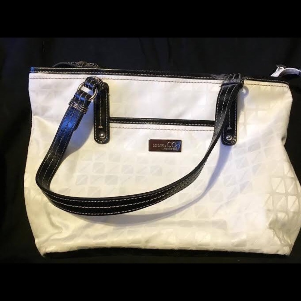 Small black and white nine and co handbag